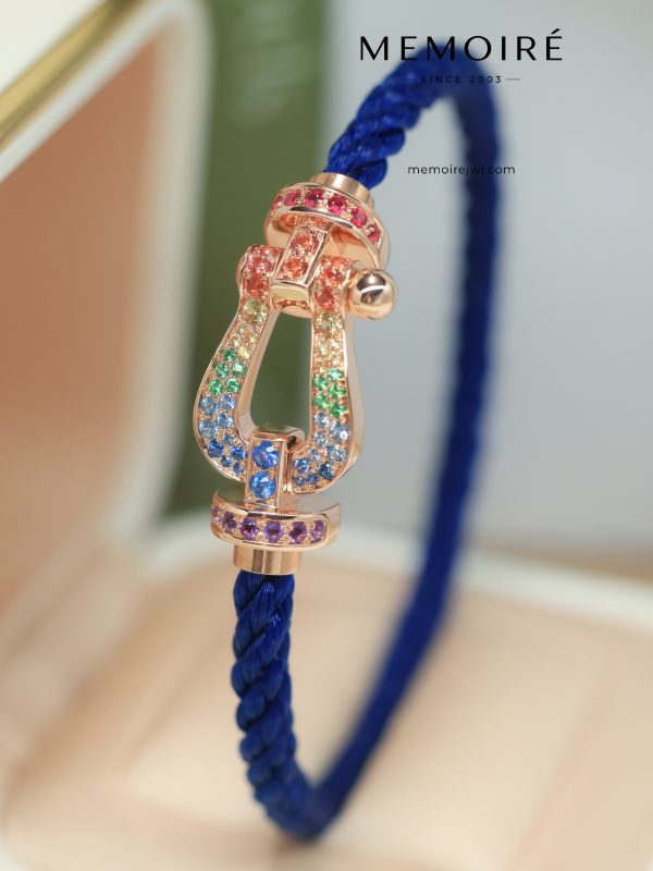 MEMOIRÉ Rose Gold Large Multicolored Gemstone Horseshoe Buckle Blue Nylon Cord Bracelet