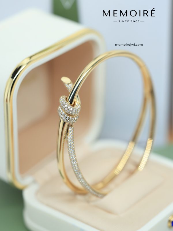 MEMOIRÉ Yellow Gold Knot Bangle with Partial Diamond Pavé